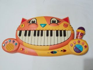 B.  Toys Meowsic Musical Keyboard Microphone Piano Playing Toy