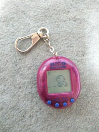 Clear Pink Nano Baby Giga Pets Virtual Pet Tamagotchi Playmates 1997