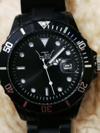 Unisex Ltd Adult Analogue Black Plastic Strap Watch - Exclusive Edition.  Light