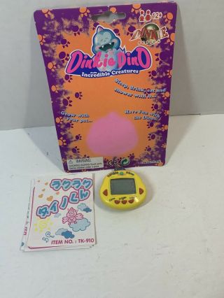 Tamagotchi Dinkie Dino Yellow Virtual Pet Tk - 910 Rakuraku Dinokun