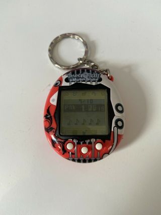 Tamagotchi Connection V6 - Music Star Red Guitar 2004 - With Battery