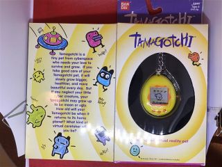 Tamagotchi Yellow Egg W/ Orange Buttons Bandai 1996 - 1997 Vr Tiny Pet Egg