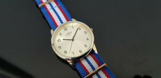 Limit Gold Plated Gents Watch On Nato Style Watch Strap.  Gold Champagne Dial.