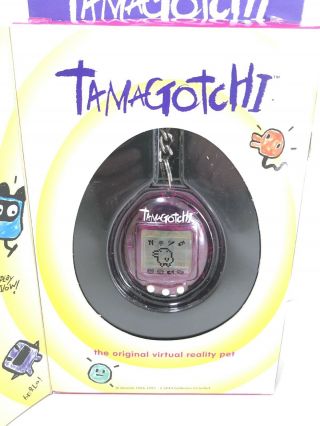 Tamagotchi 1996 - 1997 Clear Purple -