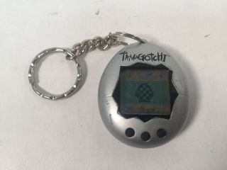 Tamagotchi Connection Silver Black Bandai 1997 Digital Virtual Pet Keychain