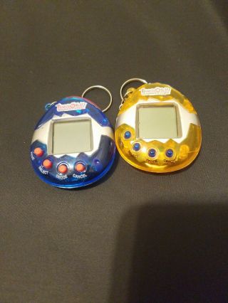 Set Of 2 Bandai Tamagotchi Connection Blue Silve And Orange Silver Electric Toy