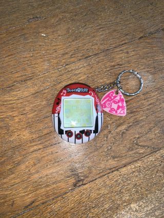 2004 Tamagotchi Music Star Red With Pick And Charm