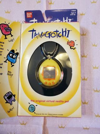 Bandai Tamagotchi Yellow/orange 1996 - 1997 In Package