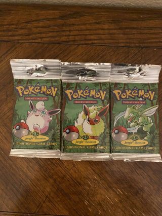 Three 1999 Pokemon Jungle Booster Pack Factory