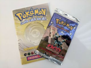 OPENED 1st Edition Pokemon Neo Genesis Booster Pack,  Book 10 NM cards 2000 psa? 3