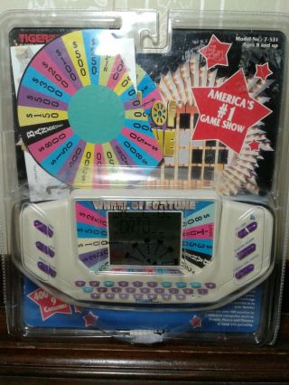 Vintage 1995 Wheel Of Fortune Tiger Electronic Handheld Game Complete In Package