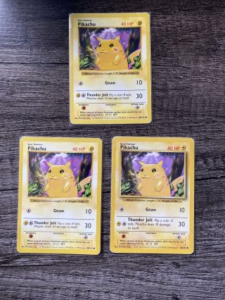 1999 Pokemon - Pikachu (shadowless,  Normal,  Red) - Base Set - Played - 3 Cards