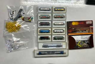 Marklin Z Scale Assorted Set.  12 Freight Cars.  1 Marklin 8985 & Spare Parts.