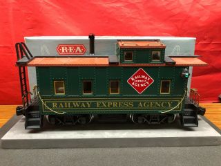 Rea Company G Scale - Railway Express Agency Lighted & Smoking Caboose,