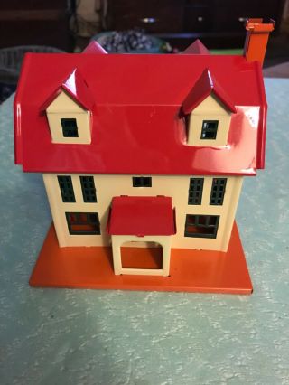 Frank Bowers Colorful Metal House - Red Roof