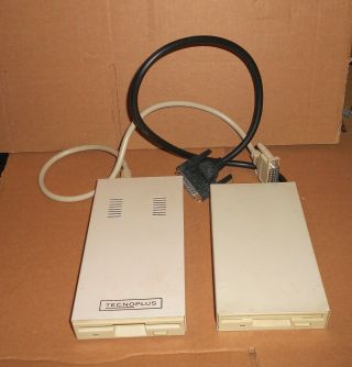 2 Vintage Commodore Amiga 3.  5 " External Floppy Disk Drives - Saturn & Tecnoplus