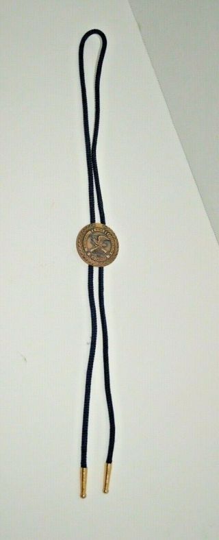 Vintage National Rifle Association Nra - Seal Bolo Tie Gold Tone With Navy Cord