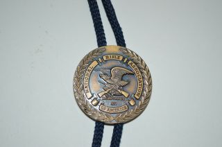 Vintage National Rifle Association NRA - Seal Bolo Tie Gold Tone with Navy Cord 2