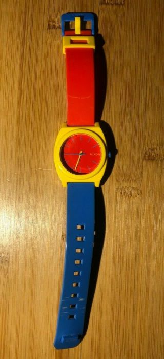 Yellow/ Blue/ Red Nixon Minimal The Time Teller Men’s Watch - Needs Battery