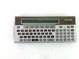 Sharp Pc - 1500 Pocket Computer Electronic Calculator And A6