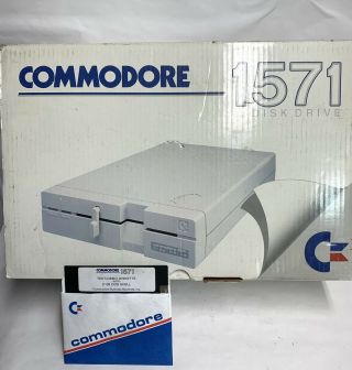 Commodore 1571 Disk Drive W/ Cables & Box (powers On / Otherwise) As - Is