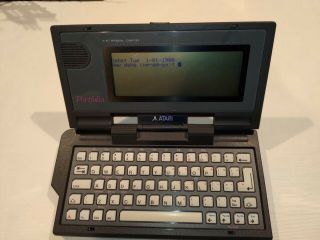 Atari HPC - 004 Portfolio Portable Pocket Handheld Computer turns on 2