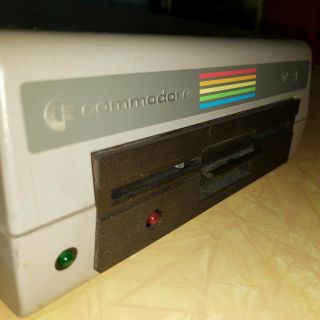 Commodore 1541 Floppy Disk Drive.  Dusty, .  From An Old Electronic Store.