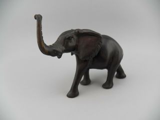 Vintage Hand Carved Wood Ebony ?? Elephant Raised Curled Trunk Figurine Guc