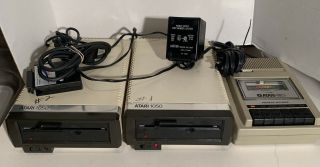 2 Vintage Atari 1050 Floppy Drive W/ 1 Power Supply & Atari 410 Rec.  Not