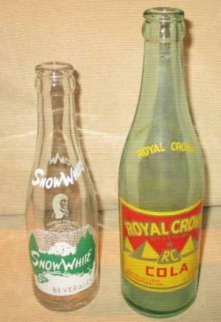 Two Vintage Soda Bottles - Royal Crown Rc Cola & Snow White