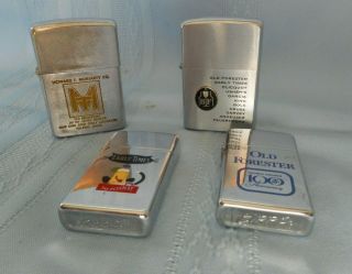 Four Vintage Zippo Lighters Old Forester Early Times Howard Moraity