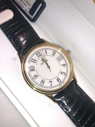 Cyma 18k Gold Watch With Black Leather Band,  White Dial,  Arabic Numerals