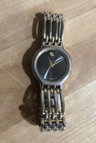 Movado Gold And Silver Tone Black Face Womens Watch 97az8888 Needs Battery