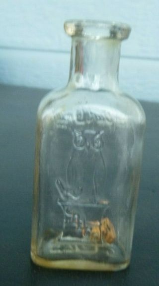 Vintage The Owl Drug Store Bottle.  Cork.  Flat Front.  3 1/4 " Embossed Owl