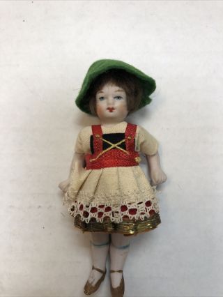 Antique German All Bisque Doll Jointed Arms And Legs Green Hat