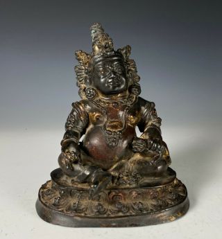 Old Chinese Bronze Statue Of Seated Figure Holding Animal