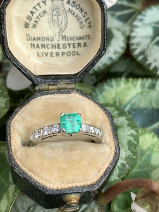 Antique Art Deco Platinum Emerald And Diamond Square Ring.
