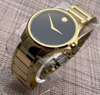 B.  Movado Ario 18k Gold Plated Stainless Steel Model 0607448 Men 