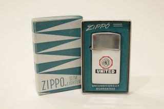 Vintage 1961 United Zippo Slim With Green Stripped Box