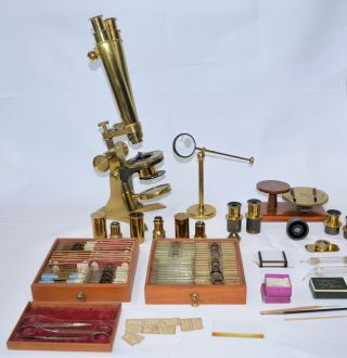 Good binocular microscope outfit by Baker with microscope preperation & slides. 3
