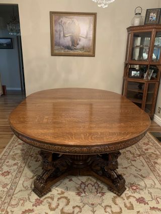 RJ Horner Quarter Sawn Oak Dining Table With Winged Griffins and 6 chairs. 2