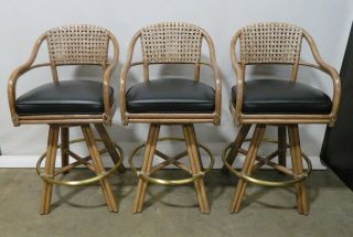 3 Vintage Mcguire Tall Swivel Counter Chairs; Black Leather Seats