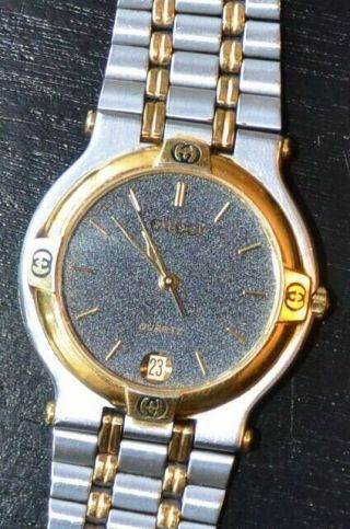 Gucci Quartz Black Faced 9000m Water Resistant Gold/silver Toned Watch