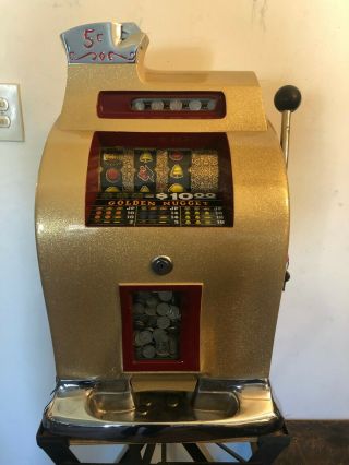 1950’s 5¢ Mills Antique Slot Machine.  Golden Model Royal Gold