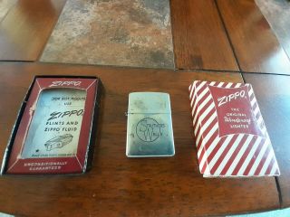 Struthers Wells Vintage Zippo Lighter.  2517191 Pat Pend