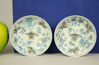 A Chinese doucai butterfly dishes with bat/peach marks Qing dynasty 3