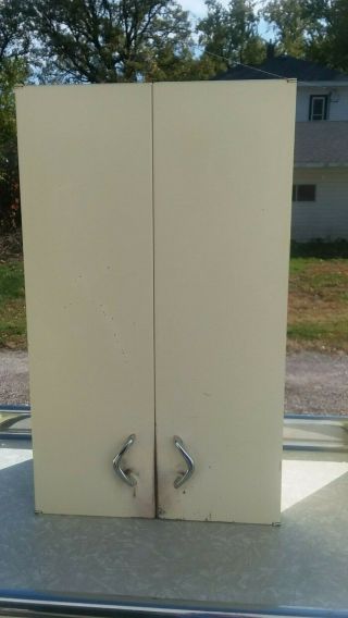 Vintage Yellow Youngstown metal kitchen cabinets.  Yellow sink in 3