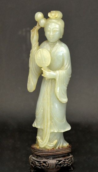 A Finely Carved Antique Chinese Celadon Jade Lady
