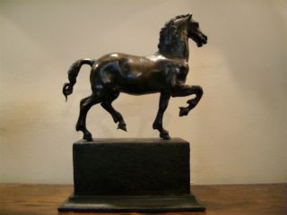 A bronze figure of a prancing horse after the antique 2