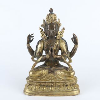Antique Chinese Gilt Copper Four Arm Buddha Statue